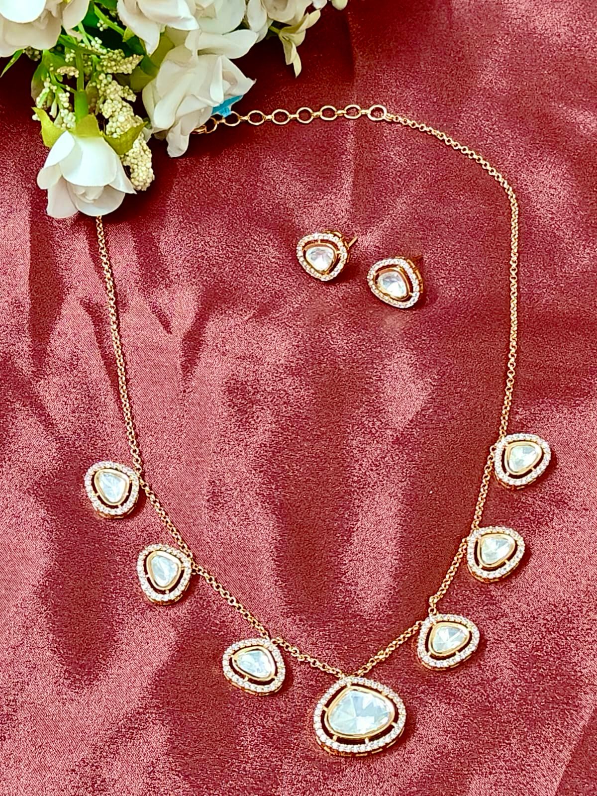 Tyaani Kundan Elegant Charm Necklace Set