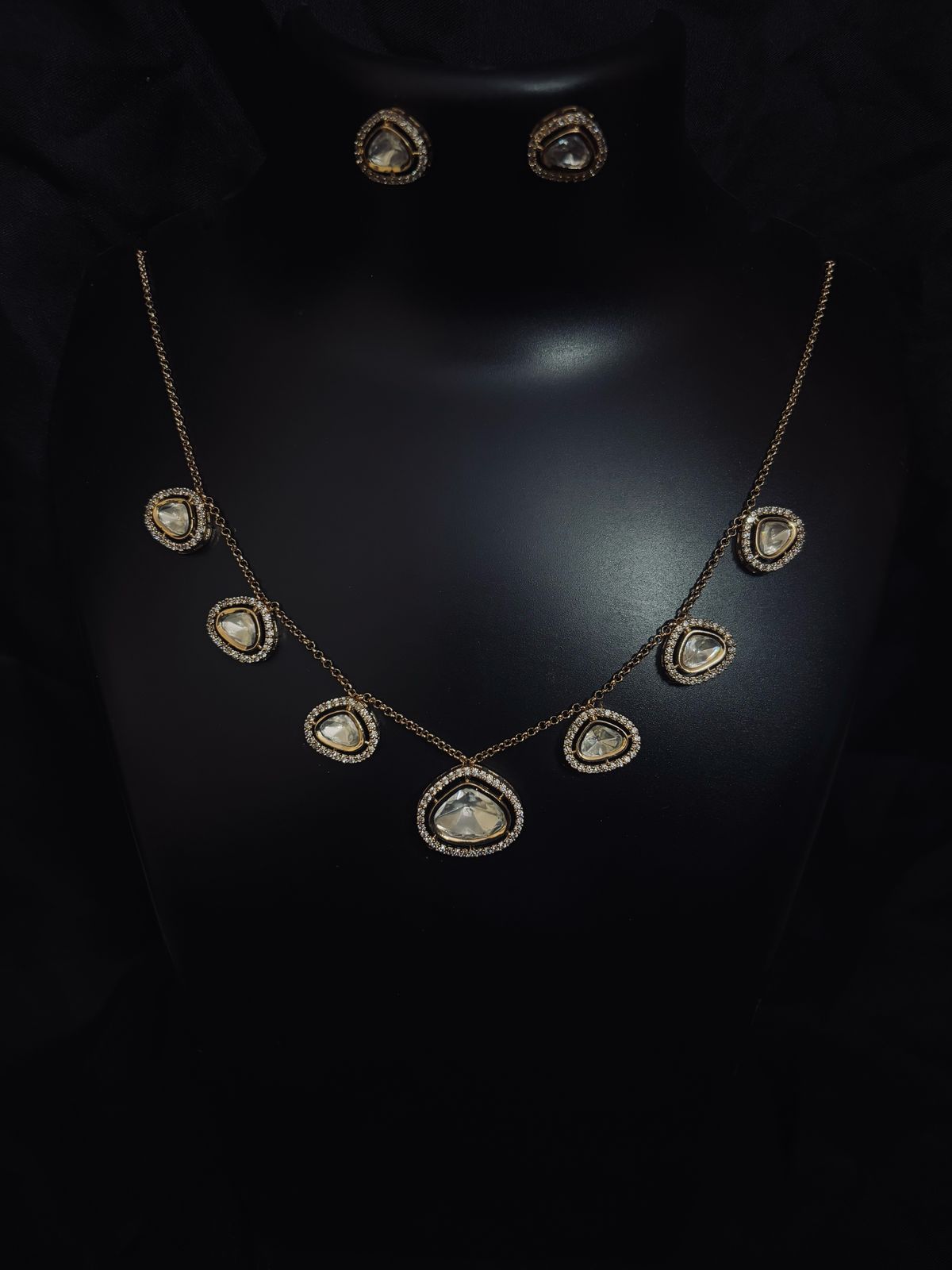 Tyaani Kundan Elegant Charm Necklace Set