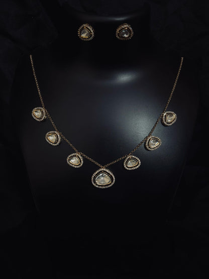 Tyaani Kundan Elegant Charm Necklace Set